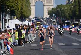 Which triathletes have qualified for the 2024 Paris Olympic Games?