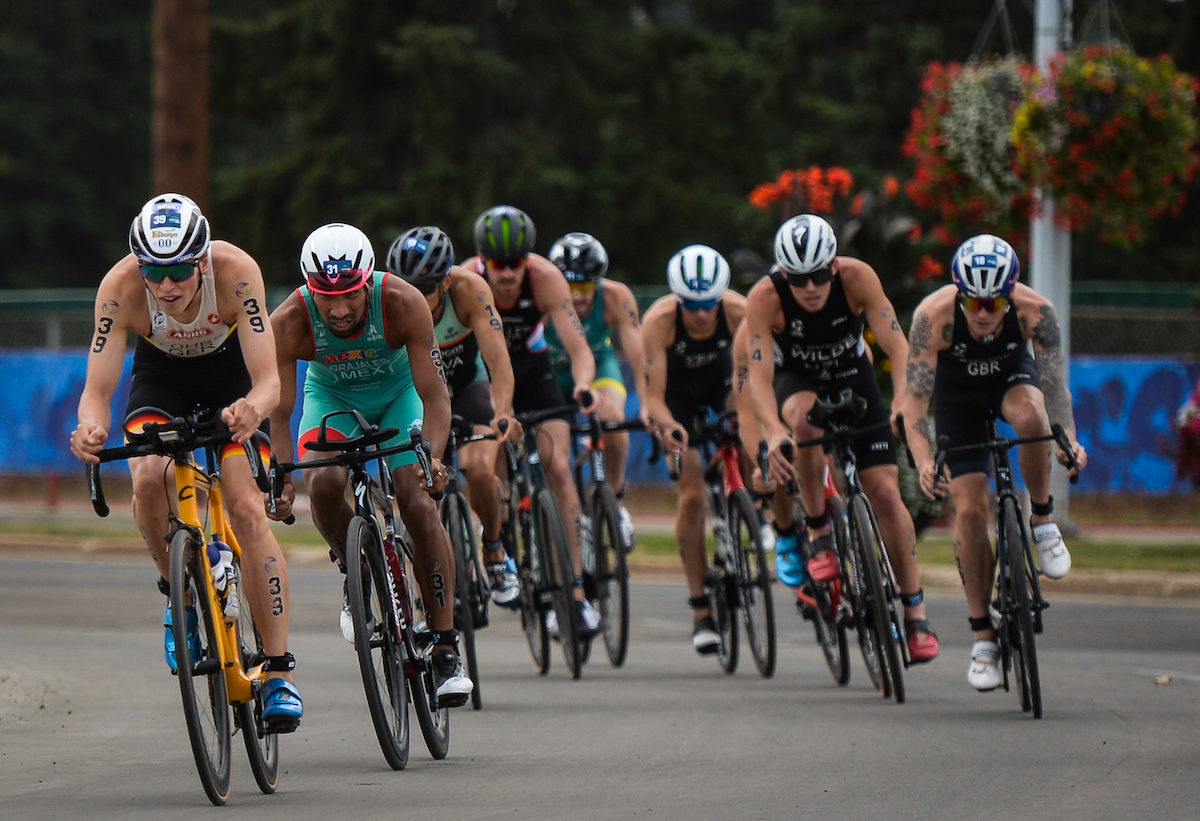 Lasse Lührs leads the bike pack at the 2021 World Triathlon Championship Finals in Edmonton, Canada