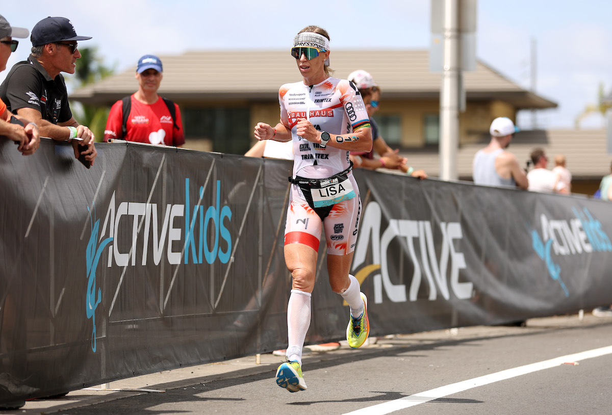 Lisa Norden competing on the final marathon of the 2022 Ironman World Championships in Kailua Kona, Hawaii