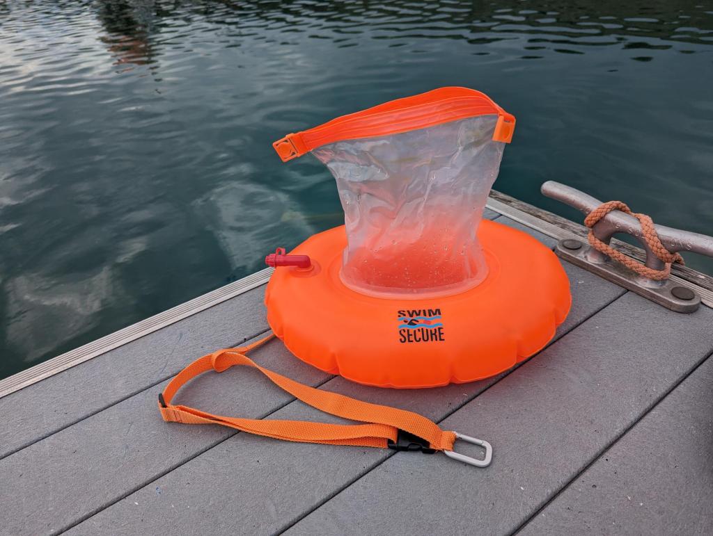 A Swim Secure Tow Donut with the central dry bag undone