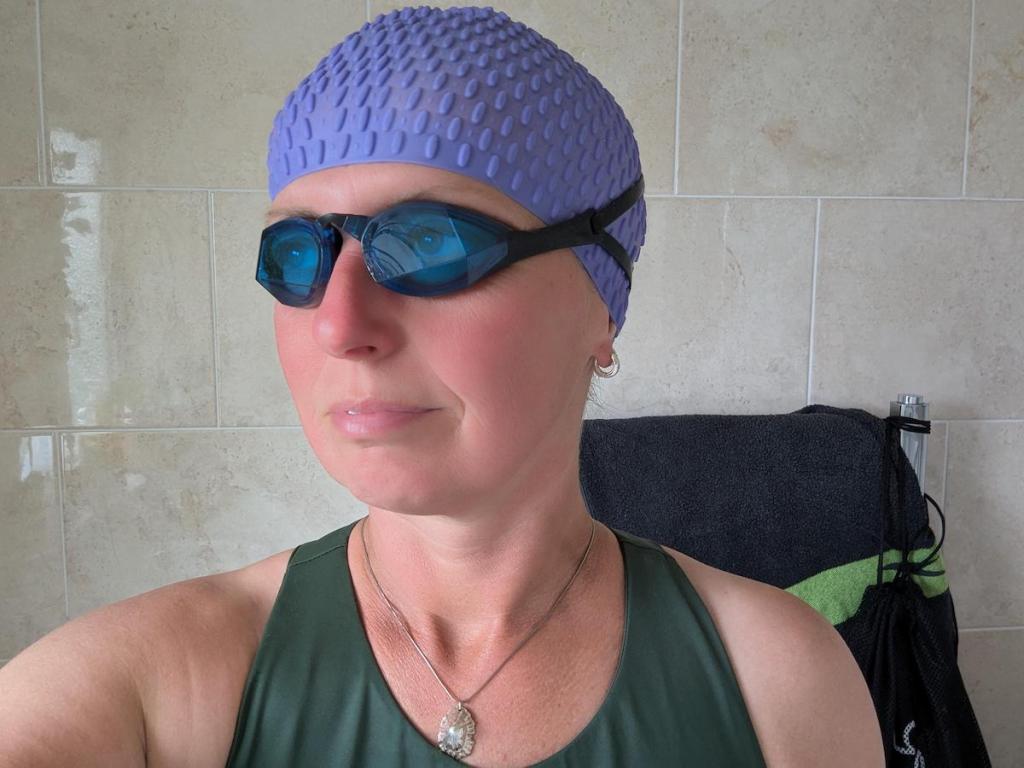 Female swimmer wearing TheMagic5 goggles in Blue Magic