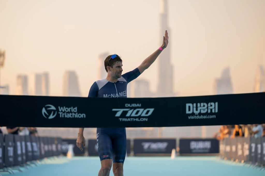 David McNamee crosses his last finish line as a pro at Dubai T100