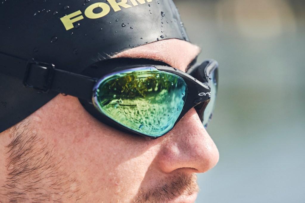 Close up of man wearing Orca Killa Comfort goggles