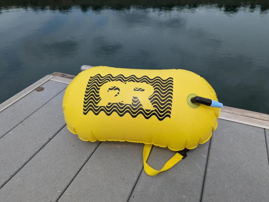 Quintana Roo yellow swim buoy on the jetty by a lake