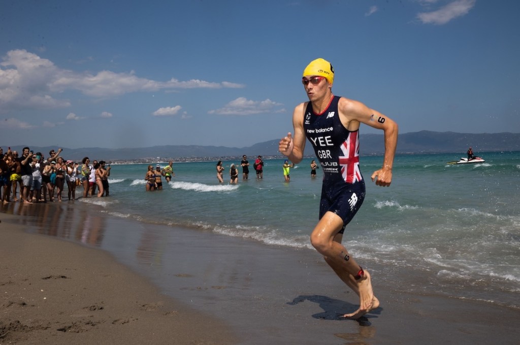 GB triathlete Alex Yee exits the swim at the 2023 Cagliari WTCS