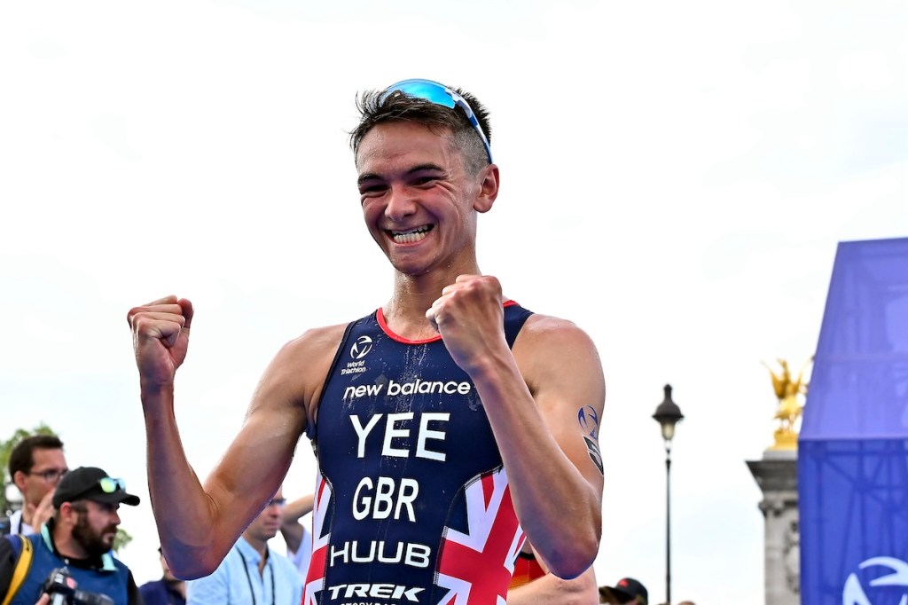Alex Yee celebrates winning the 2023 Paris Olympic triathlon test event 