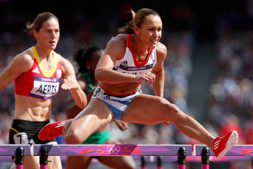 Jessica Ennis of Great Britain competes in the Women's Heptathlon 100m Hurdles Heat 1 on Day 7 of the London 2012 Olympic Games at Olympic Stadium on August 3, 2012 in London, England. (Photo by Jamie Squire/Getty Images)