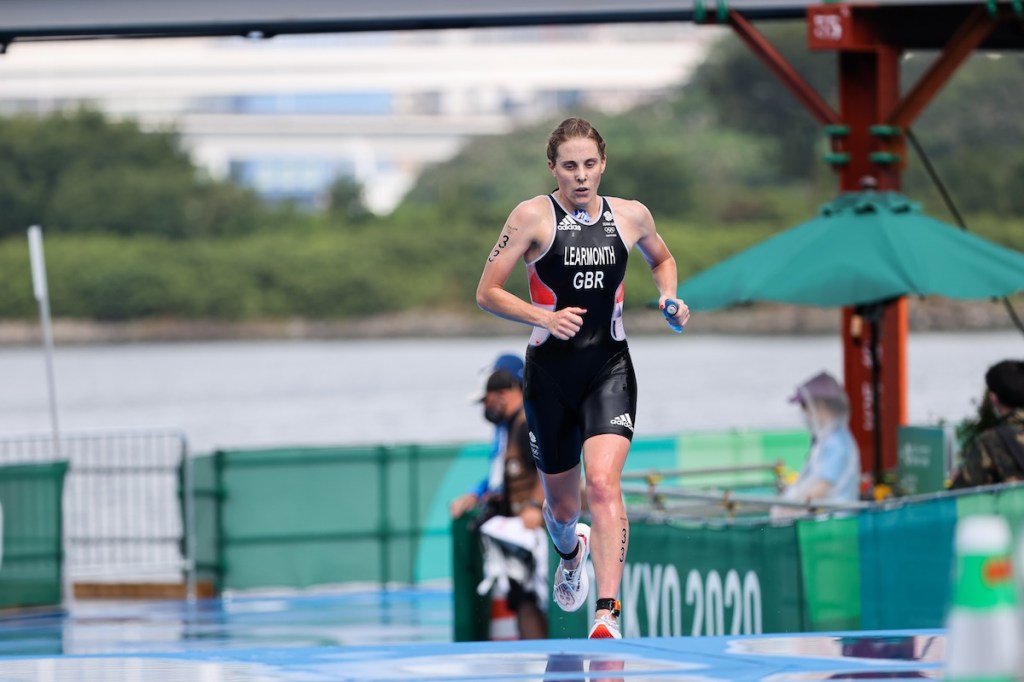 GB triathlete Jess Learmonth exits the swim in first place at the 2020 Tokyo Oltympic Games triathlon event