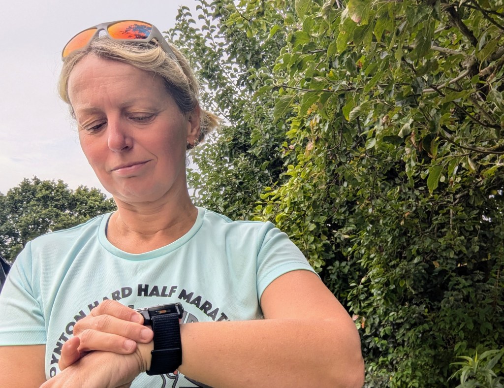 Female tester wearing the Garmin Enduro 3