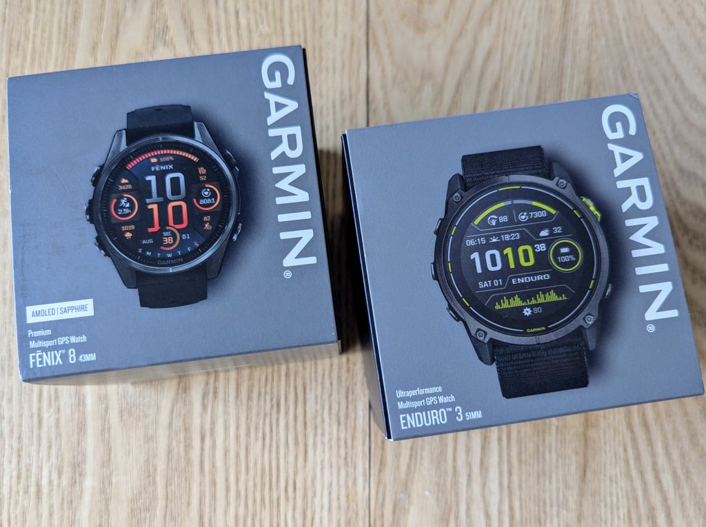 The new Garmin Fenix 8 and Enduro 3 in their boxes