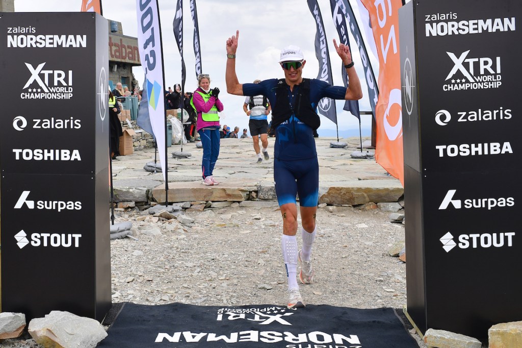 Sebastian Norberg from Sweden crossing the Norseman 2024 finish line