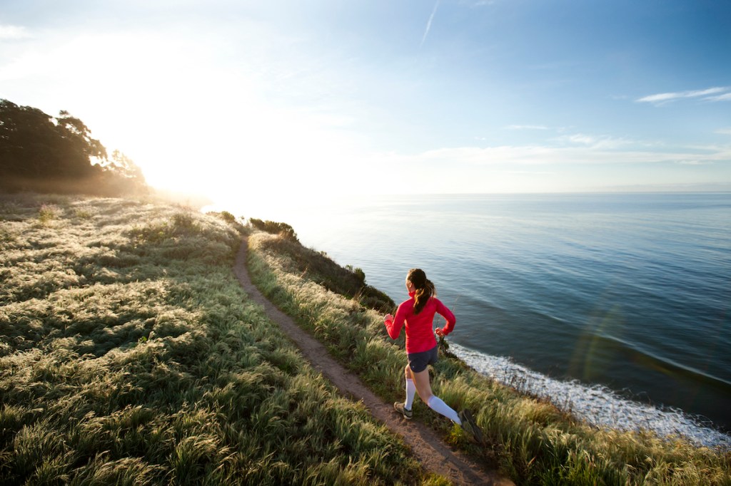 Woman doing tempo running on trails