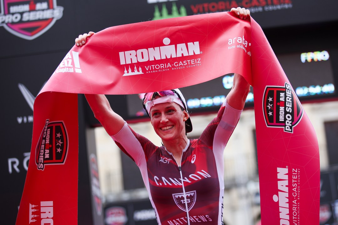 Kat Matthews takes the tape at Ironman Vitoria-Gasteiz in Spain