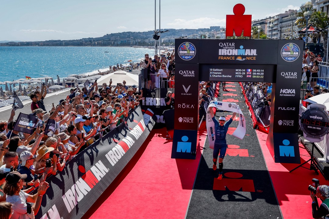 Lucy Charles-Barclay celebrates winning the women's race of Ironman France