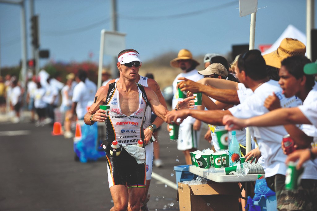 Craig Alexander runs on his way to becoming oldest-ever winner of Hawaii