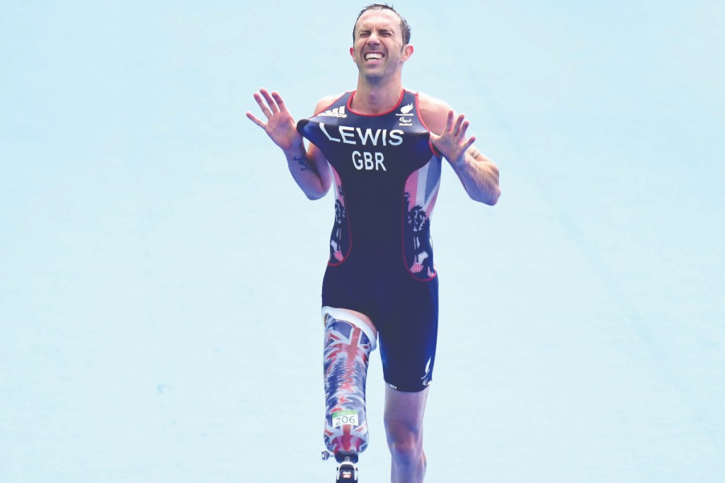 Andy Lewis takescvictory in the PT2 category to become the first-ever GB Paralympic paratri medallist.