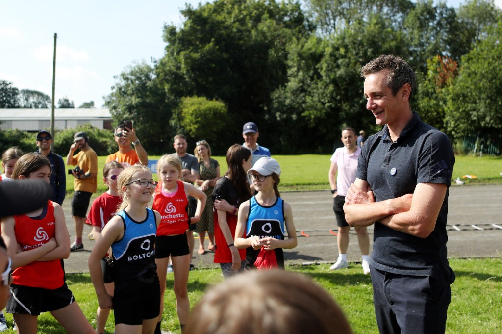 Alistair Brownlee talking to young sports people