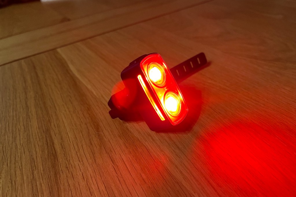 Giant Recon TL rear light switched on sitting on table