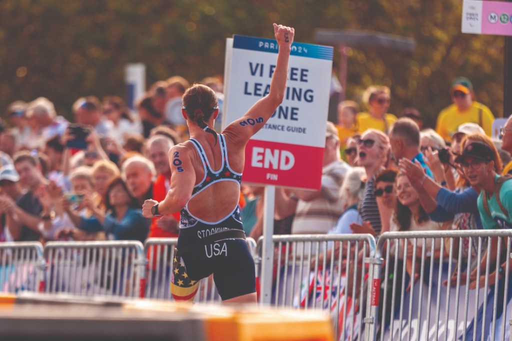 Melissa Stockwell celebrates with crowd at Paris 2024