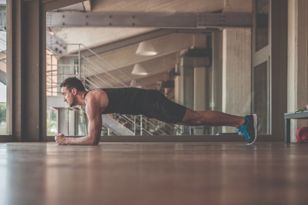 man holding plank exercise