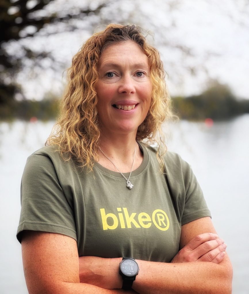 Sarah Broadley standing in front of a lake