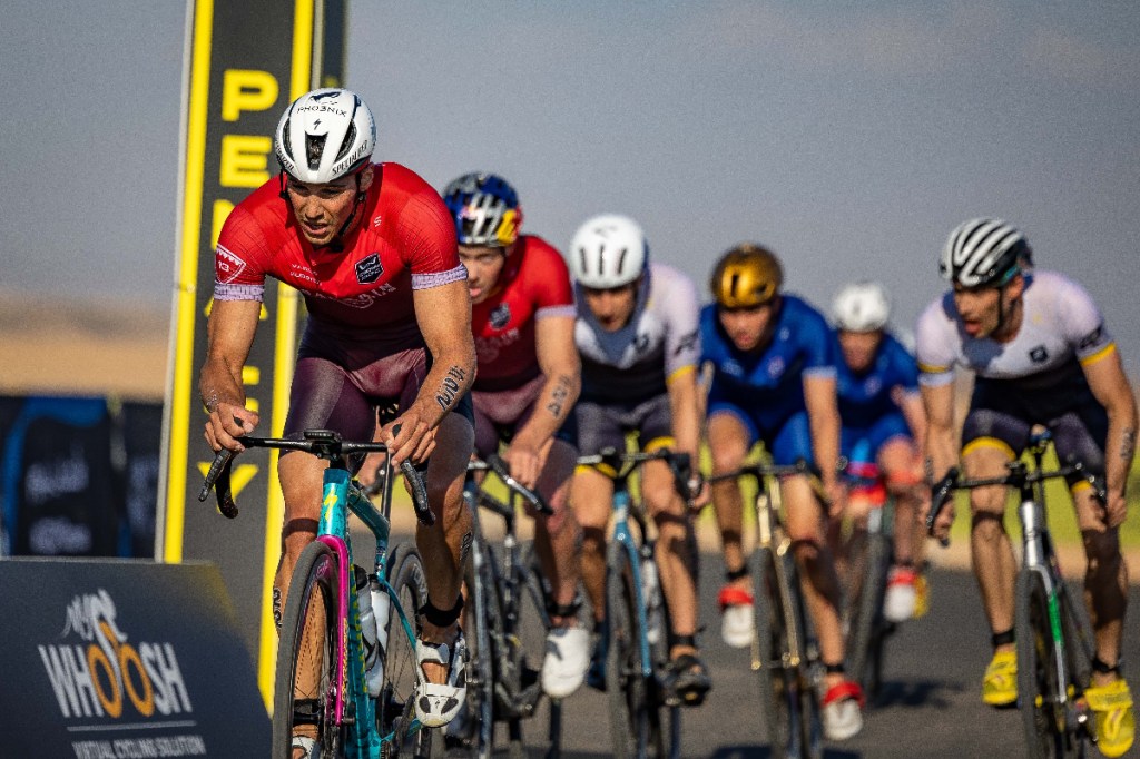 Vincent Luis leads the peloton at the final race of the 2024 supertri series in NEOM, Saudi Arabia, his last-ever, pro short-course race