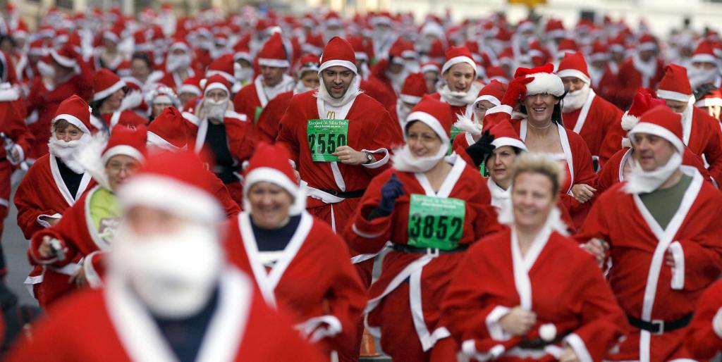 Runners in Santa outfits