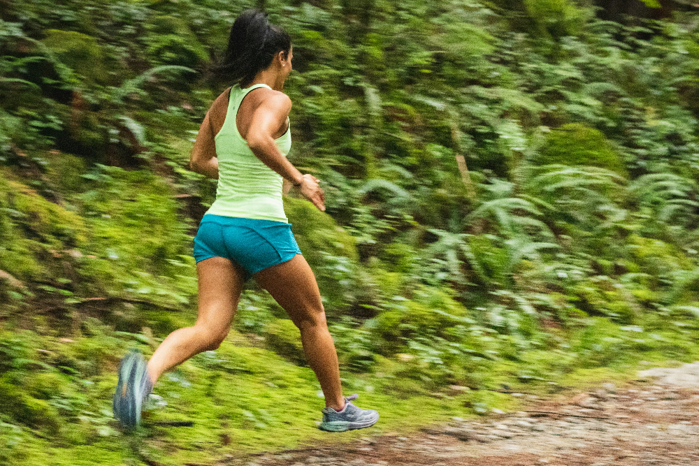 Woman running on trail